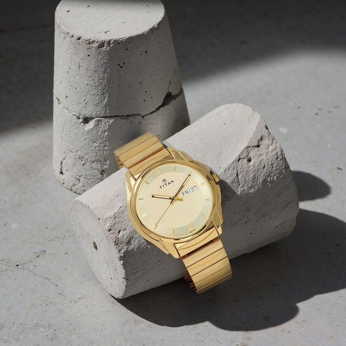 Titan Quartz Analog with Day and Date Champagne Dial Golden Stainless Steel Strap Watch For Men 1