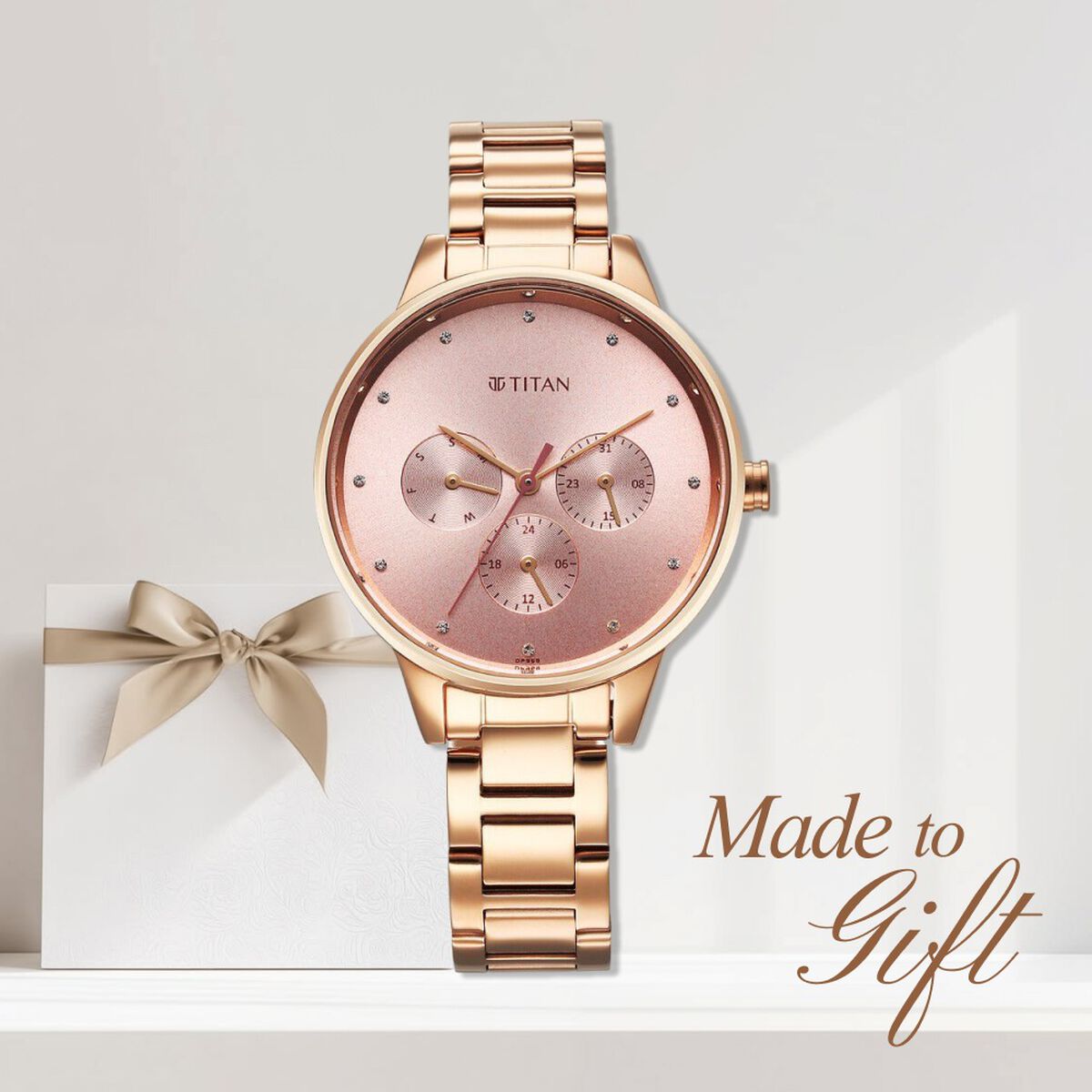 Titan Purple Razzle Dazzle Quartz Analog with Day and Date Pink Dial Rose Gold Stainless Steel Strap Watch For Women 1