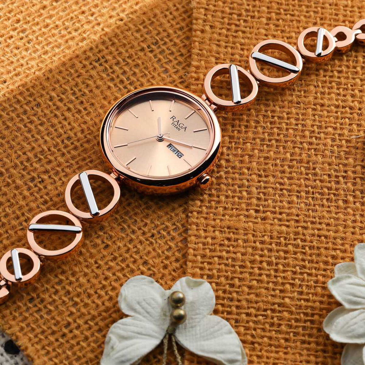 Titan Raga Viva Quartz Analog with Day and Date Rose Gold Dial Two Toned Metal Strap Watch For Women 1