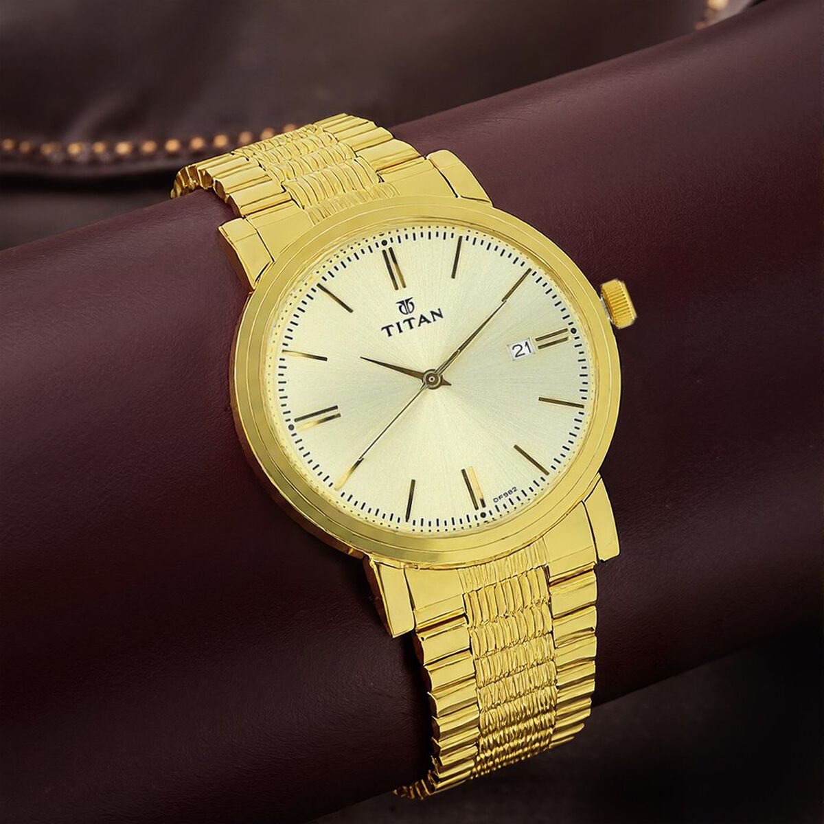 Titan Quartz Analog with Date Champagne Dial Golden Stainless Steel Strap Watch For Men 1